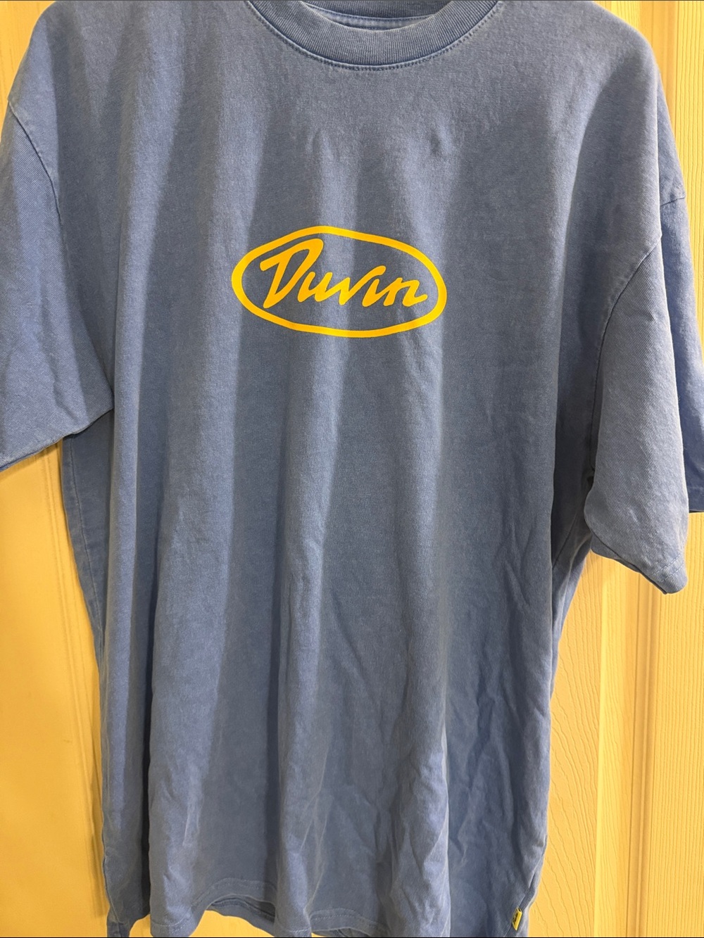 Men's Blue Short-Sleeve Tee with Yellow Hibiscus Graphic Duvin